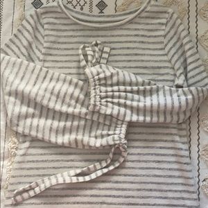 Grey and white striped sweater with bell sleeves